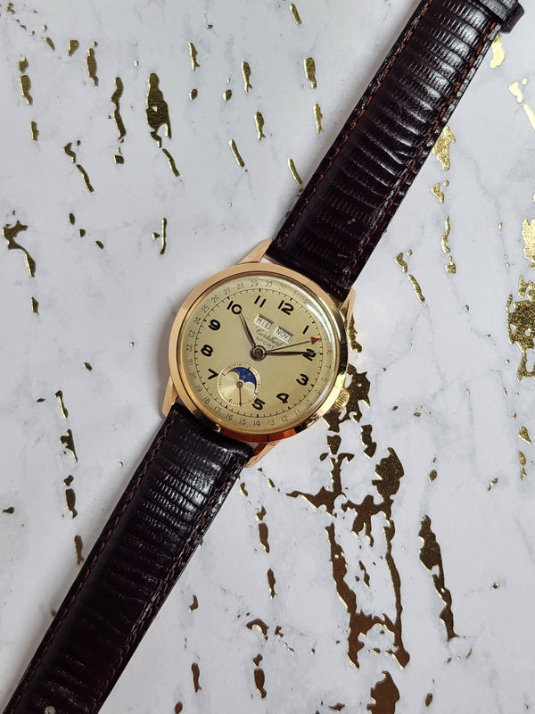 1940's Vintage Cortebert Sport Triple Date Italian Day Moonphase 18k Gold Watch - Experts Watches